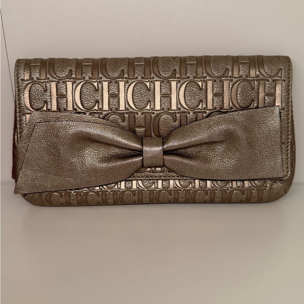 CH Bronze Platinum Clutch with Decorative Bow and Textured Pattern